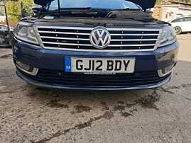 Bara Spoiler Fata cu Locas senzor Parcare si Spalatoare Faruri cu Grile si Proiectoare Fara Grila cu Emblema Volkswagen CC 2012 - 2017 Culoare LH5X [K7654]