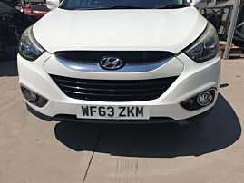 Bara Spoiler Fata Completa cu Grila cu Emblema si Grile Proiectoare Hyundai ix35 2009 - 2015 Culoare TCW [Q2938]