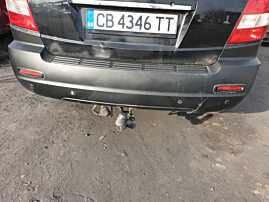 Bara Spoiler Spate cu Locas Senzori Parcare cu Defect Kia Sorento NFL Non Facelift 2002 - 2006 Culoare YC [C8149] (lac sarit,o crapatura)