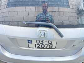 Ornament cu Emblema si Maner Clapeta Deschidere Actionare Lampi Numar Hayon Haion Portbagaj Honda Jazz 2002 - 2008 Culoare NH656M [C6017]