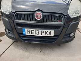 Bara Spoiler Fata Completa cu Grila Emblema si Proiectoare Fiat Doblo 2 2009 - 2015 Culoare Negru [Q4783]